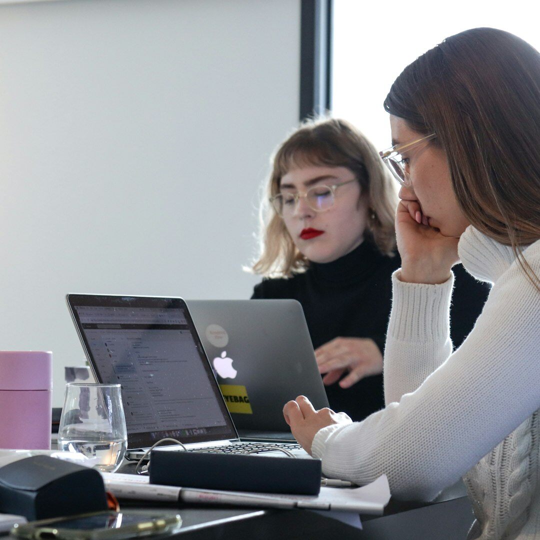 Diverse creative team reviewing footage together