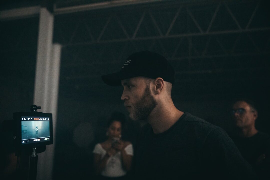 team reviewing footage on monitor